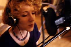 Amy Goode Faris playing her Fender Rhodes and singing Sweet Little Jesus Boy